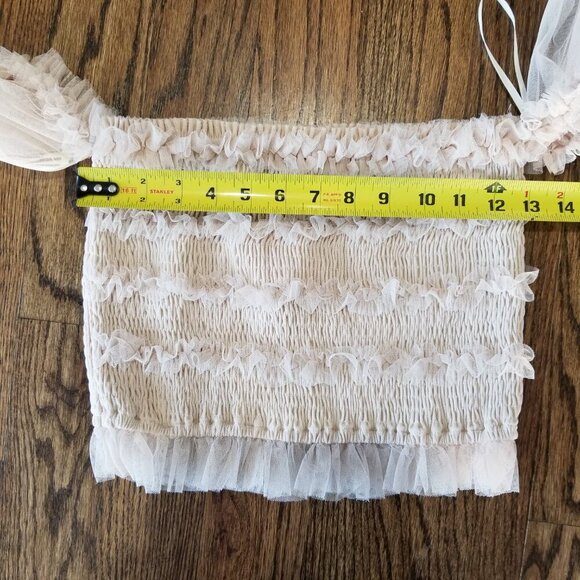 Chic Cream Crop Top with Elegant Design - Picture 9 of 10